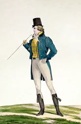 Un Dandy avec un chapeau Robinson, des boucles enfantines, des pantalons tricotés et des bottes d