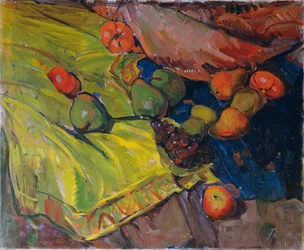 Nature morte avec fruits sur tissu vert