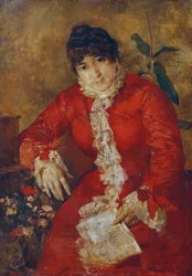Femme en robe écarlate avec journal et ficus