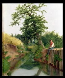Un garçon pêchant