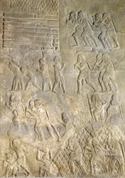 Relief représentant des porteurs apportant du bois à la côte pour le transport par mer. du Palais de Sargon II, Khorsabad, Irak