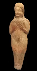 Figurine de femme nue. Terre cuite, Babylone, IIe millénaire av. J.-C. Musée de la Castre, Cannes.
