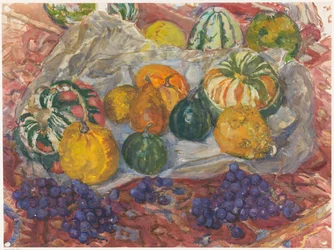 Nature morte de citrouilles et raisins sur une nappe