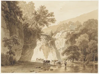 Paysage rocheux avec vaches buvant