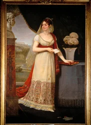 Portrait en pied de Joséphine de Beauharnais (1763-1814). Elle regarde un buste représentant son fils, Eugène Rose de Beauharnais dit le Prince Eugène (1781-1824), à Malmaison. Peinture d