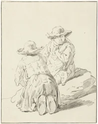 Deux garçons assis par terre