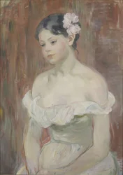 Fille avec décolleté La fleur dans les cheveux