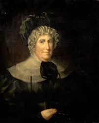 Dame avec un bonnet à volants