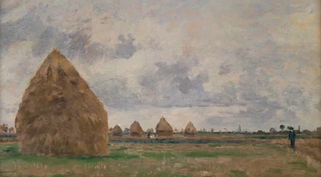 Paysage avec des meules de foin