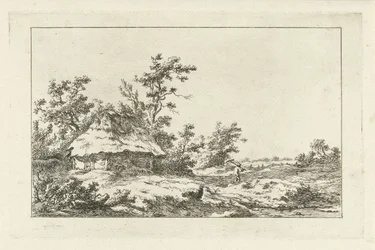 Homme avec un râteau près d