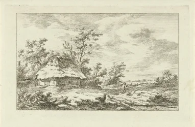 Homme avec un râteau près d