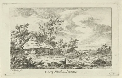 Homme avec un râteau près d