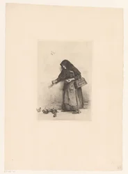Femme nourrissant des oiseaux