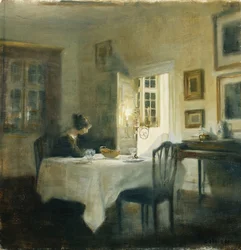 Une Femme à une Table dans une Salle à Manger