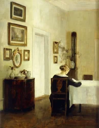 Une Femme à une Table dans un Intérieur