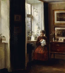 Une jeune fille cousant