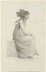 Jeune Femme Assise Portant un Chapeau à la Mode