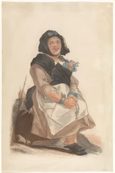 Homme déguisé en femme avec un chapelet, assis