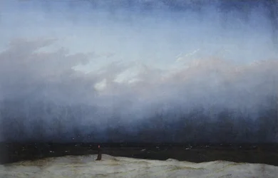 Un moine au bord de la mer