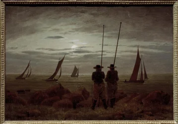 Nuit de lune sur la plage avec des pêcheurs