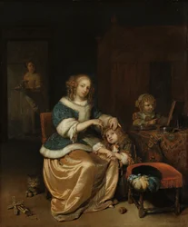 Intérieur avec une mère peignant les cheveux de son enfant, connu sous le nom de 