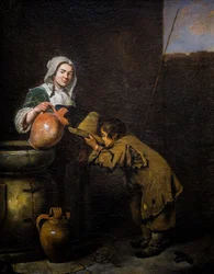Jeune ramoneur buvant près d