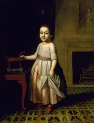 Garçon avec cheval jouet