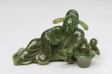 Figure de savant chinois allongé
