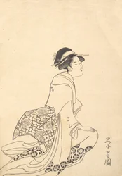 Une femme agenouillée