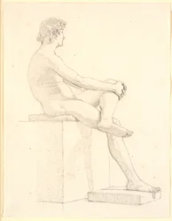 Jeune modèle masculin assis