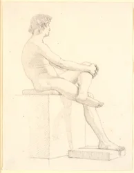 Jeune modèle masculin assis