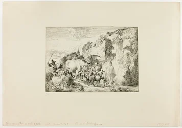Troupeau passant par une arche de roche