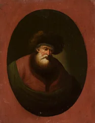 Vieil homme avec un tissu vert