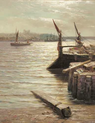 Barges amarrées au bord de la rivière