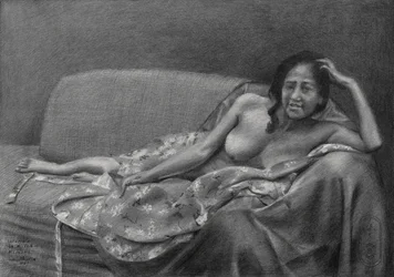 Femme allongée, pensive