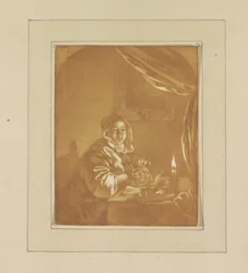 Dame à la lumière des bougies