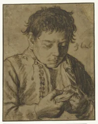 Garçon enlevant des puces, mi-longueur