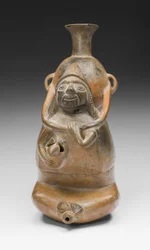 Vase rituel représentant une femme portant un vase (Aryballos) et allaitant un enfant, 1200-1450 après J.-C.