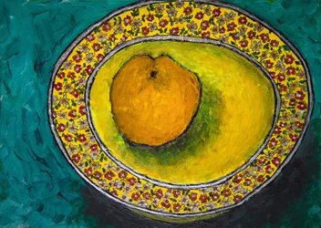 Une orange dans un bol à fleurs