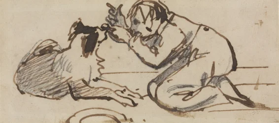Un enfant jouant avec un chien