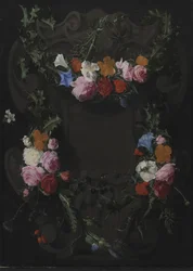 Cartouche en pierre avec une guirlande de fleurs