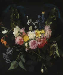 Guirlande de fleurs suspendue à deux rubans bleus