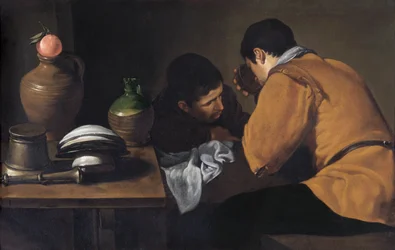 Deux jeunes hommes mangeant à une table modeste c.1618-20