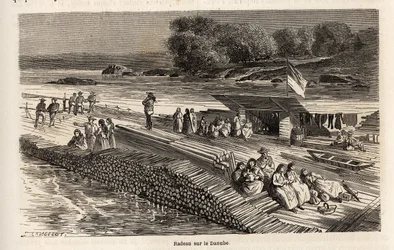 Un radeau en bois sur le Danube, pour le transport de marchandises et de personnes, dessin de Lancelot, pour illustrer le voyage de Victor Duruy de Paris à Bucarest en 1860. Gravure dans « Le tour du monde », édité par Edouard Charton