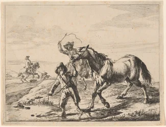 Un garçon menant un cheval boire