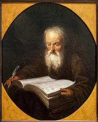 Un moine lisant, une plume à la main