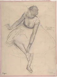 Danseuse ajustant son chausson