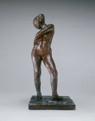 Danseuse attachant la ficelle de son collant, vers 1885-1890