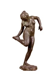 Danseuse regardant la plante de son pied droit, vers 1890