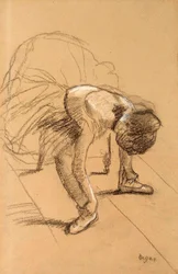 Danseuse assise ajustant ses chaussures, vers 1876